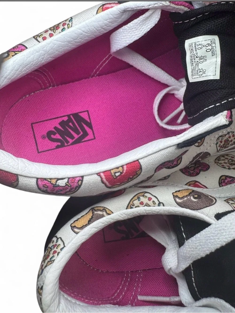 Vans Kids Low-Top Sneakers in Black, White and Pink Heart Print